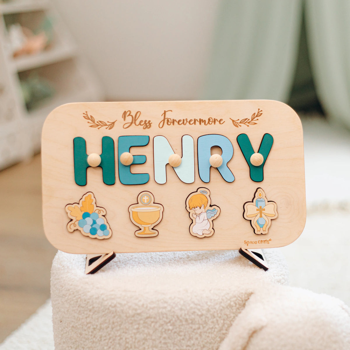 Personalized Henry baptism name puzzle displayed on wooden stand