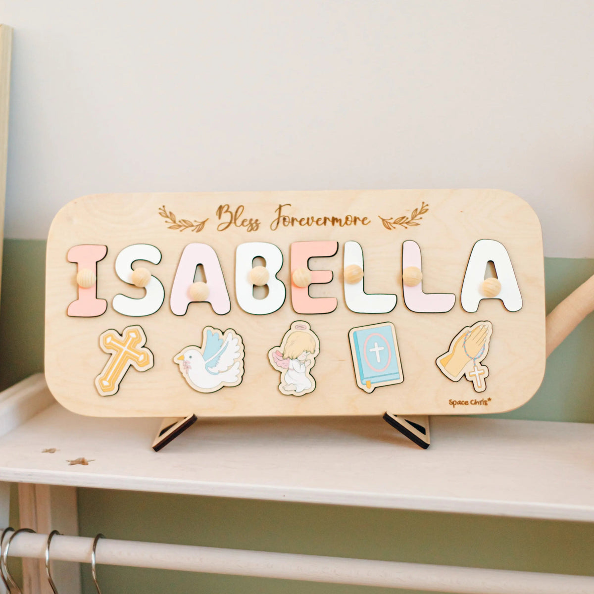 Personalized Isabella baptism name puzzle on wooden stand