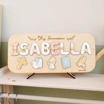 Personalized Isabella baptism name puzzle on wooden stand