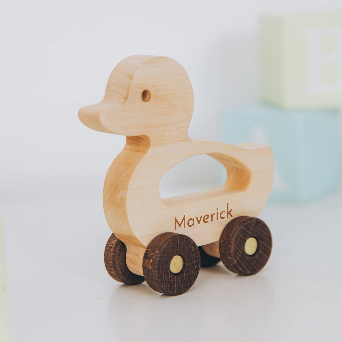 Personalized light wood duck push toy with name Maverick