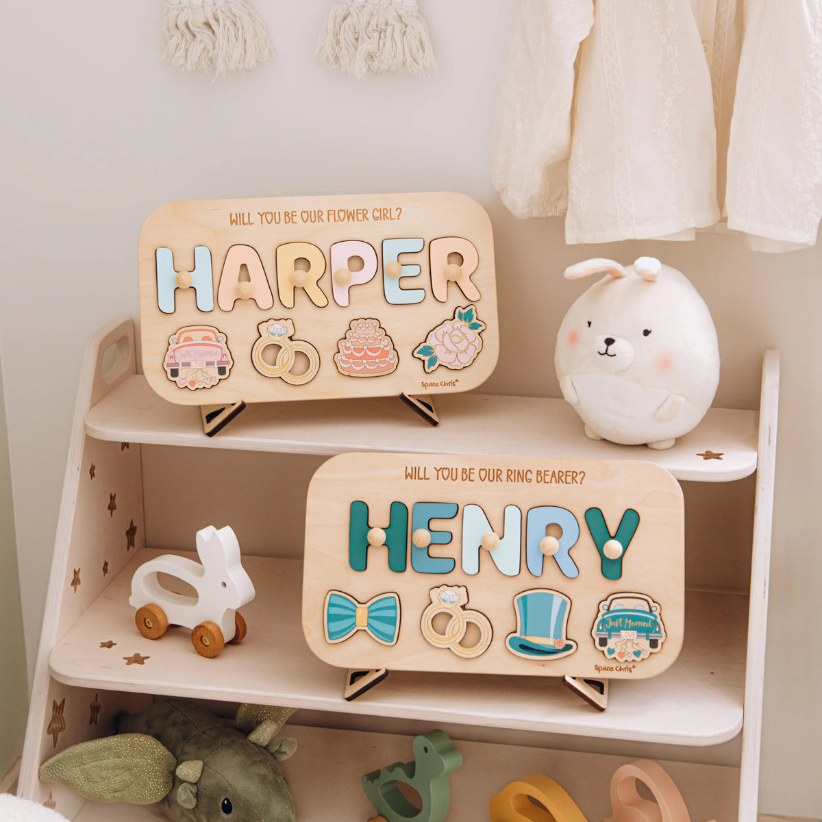 Harper and Henry personalized wedding proposal puzzles on nursery shelf