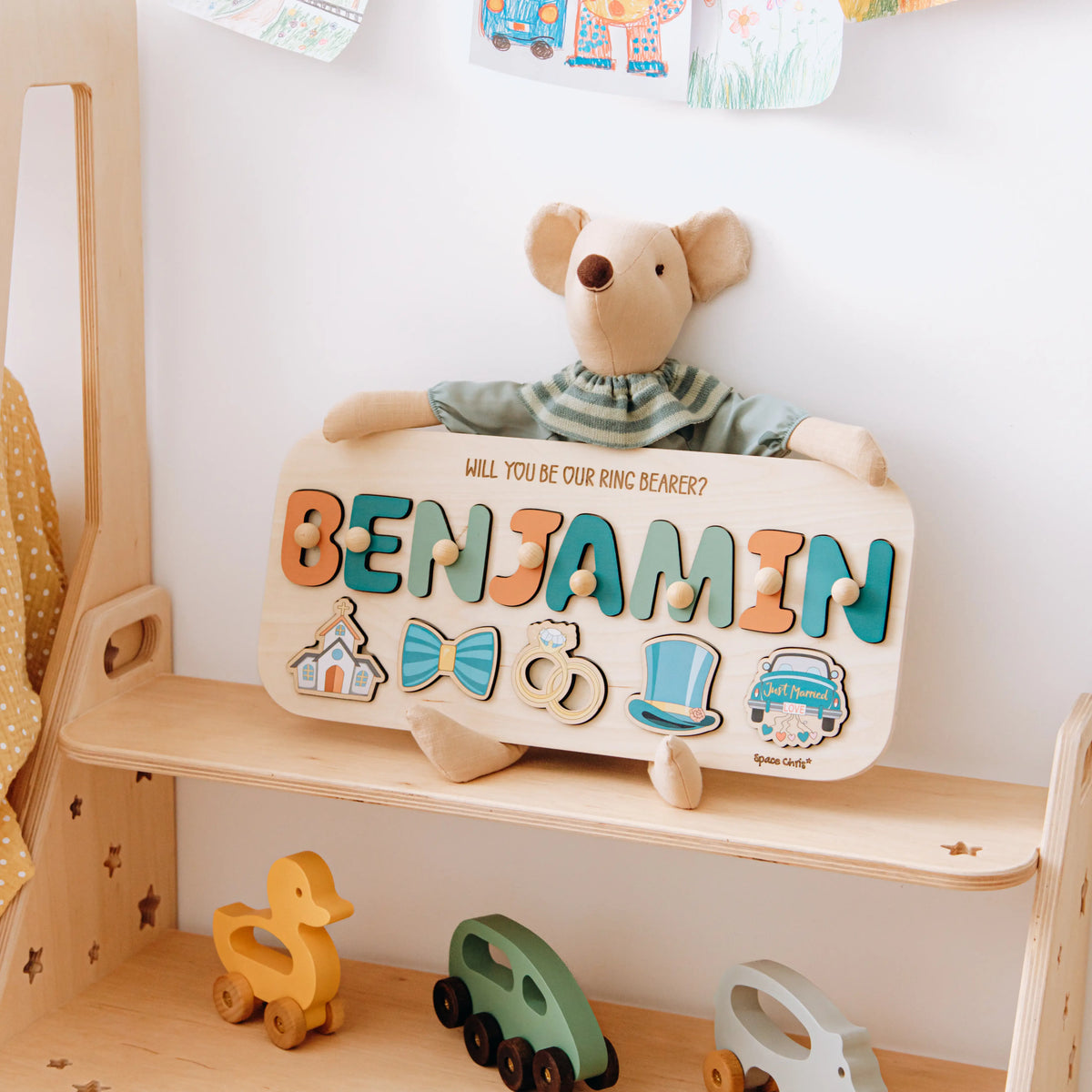 Personalized Benjamin ring bearer puzzle displayed on nursery shelf