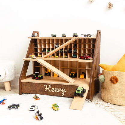 Front view of a dark wood toy car garage with 70 cells full of toy cars