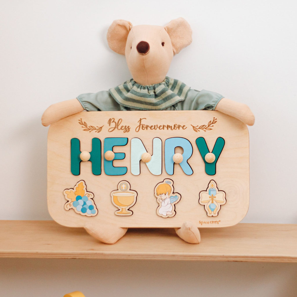 Personalized Baptism Name Puzzle with name Henry on wooden shelf