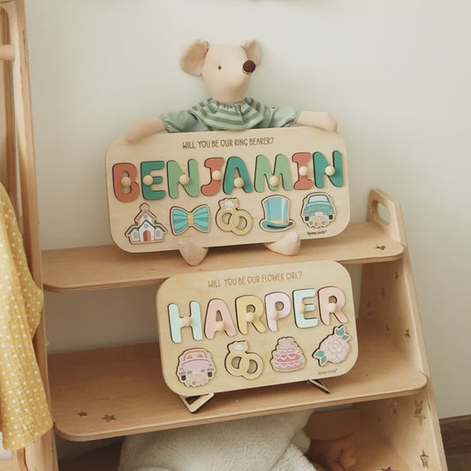 Video of personalized ring bearer and flower girl name puzzles